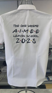 Personalised Friends Inspired white school leavers shirt, displayed on a mannequin in an embroidery workshop.